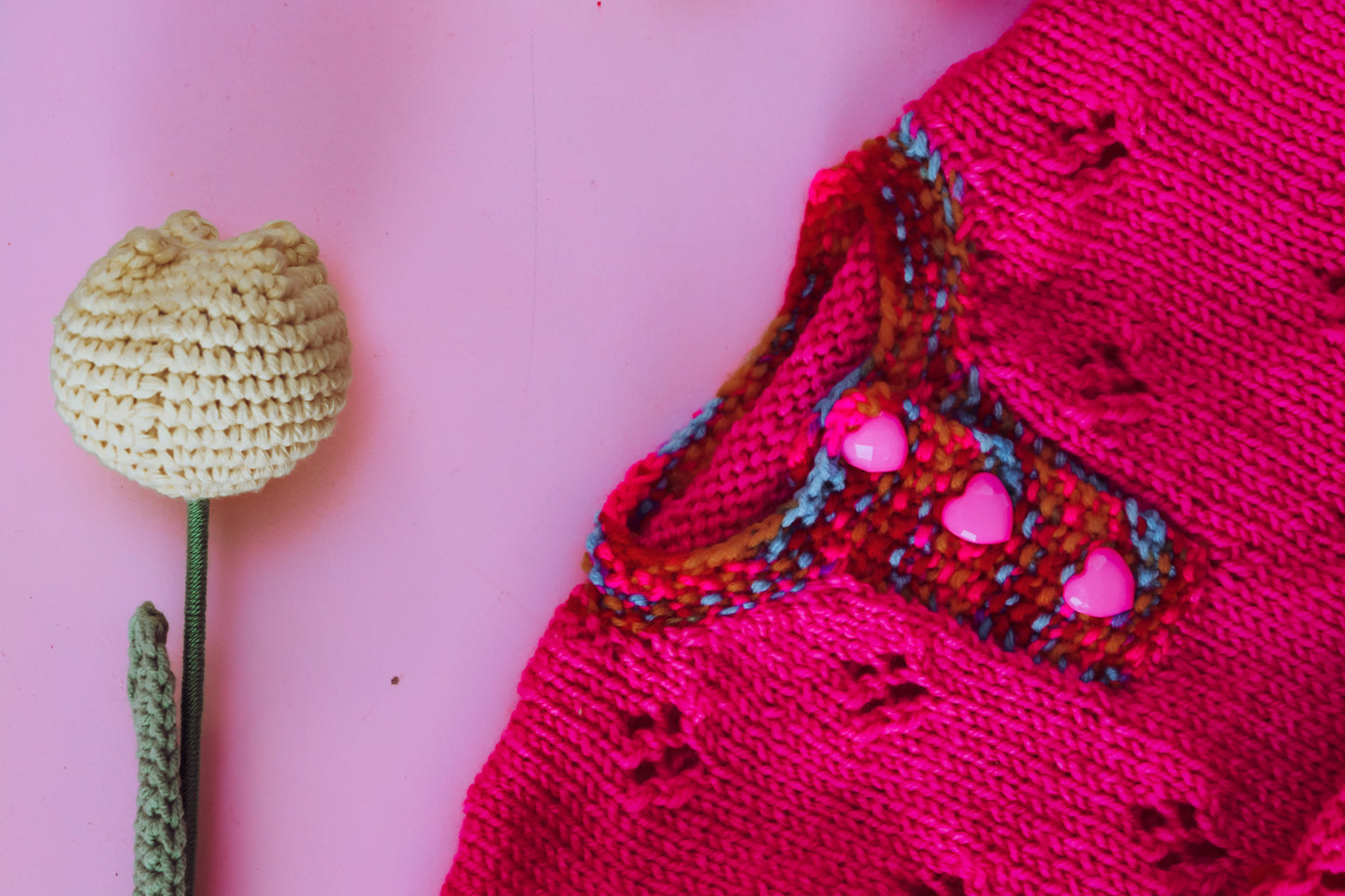 Hand knitted pink jumper with trim