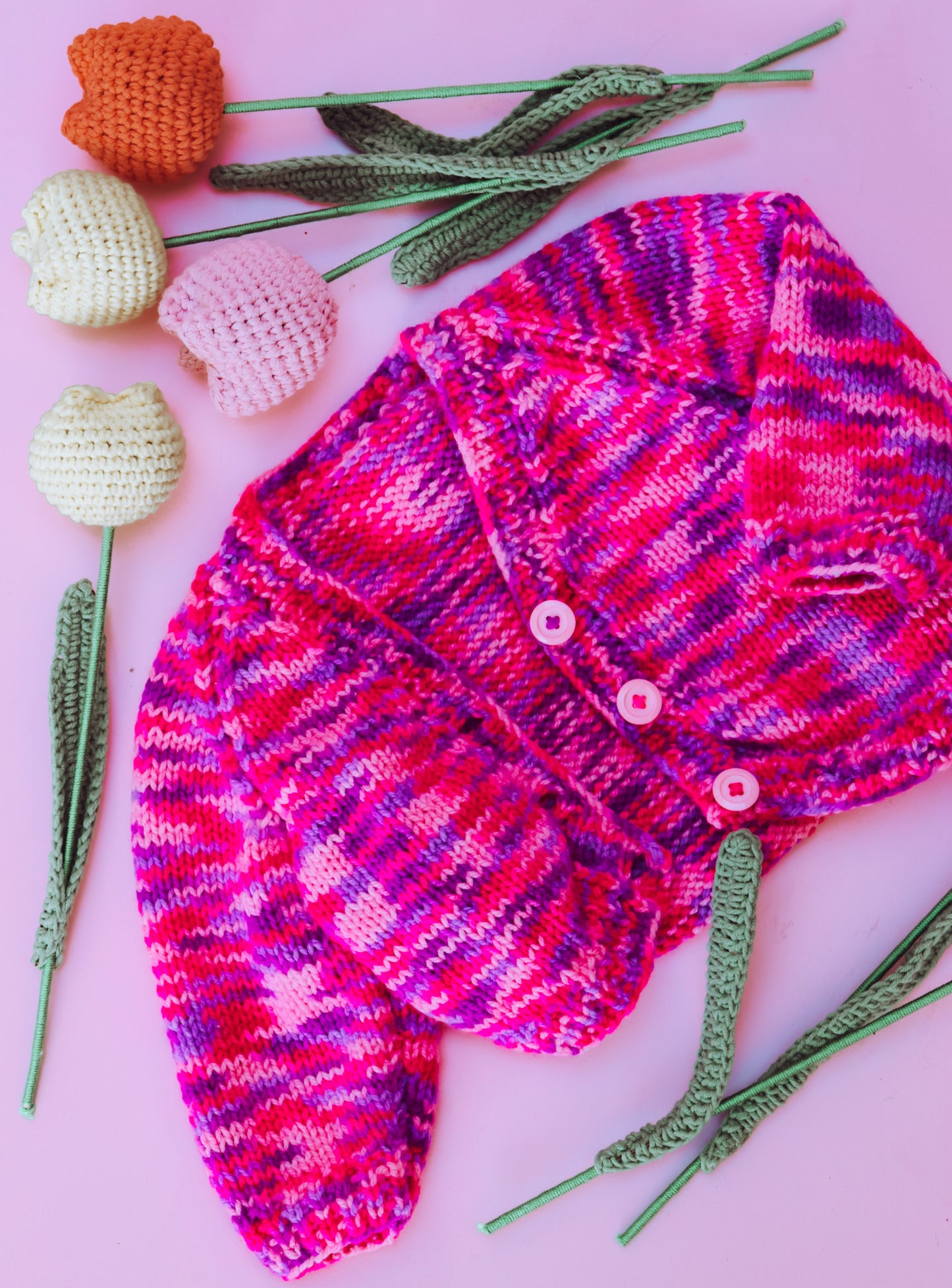 Hand knitted pink and purple jumper