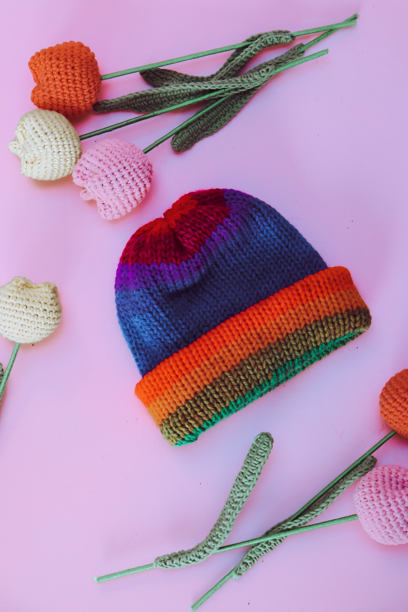 Hand knitted rainbow beanie