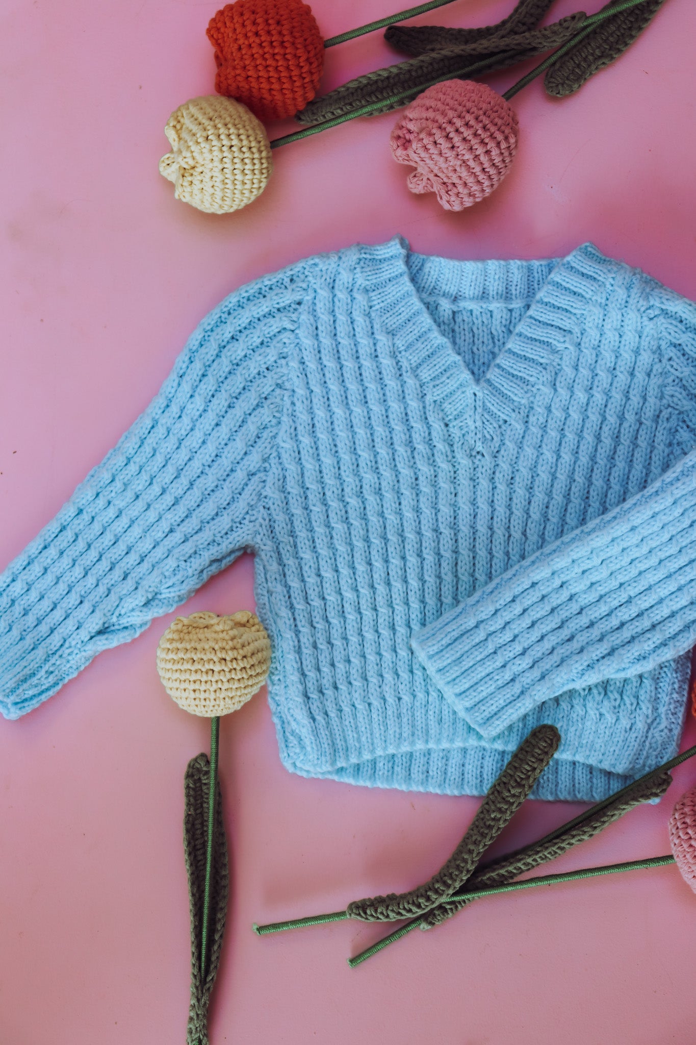 Hand knitted Blue V neck jumper