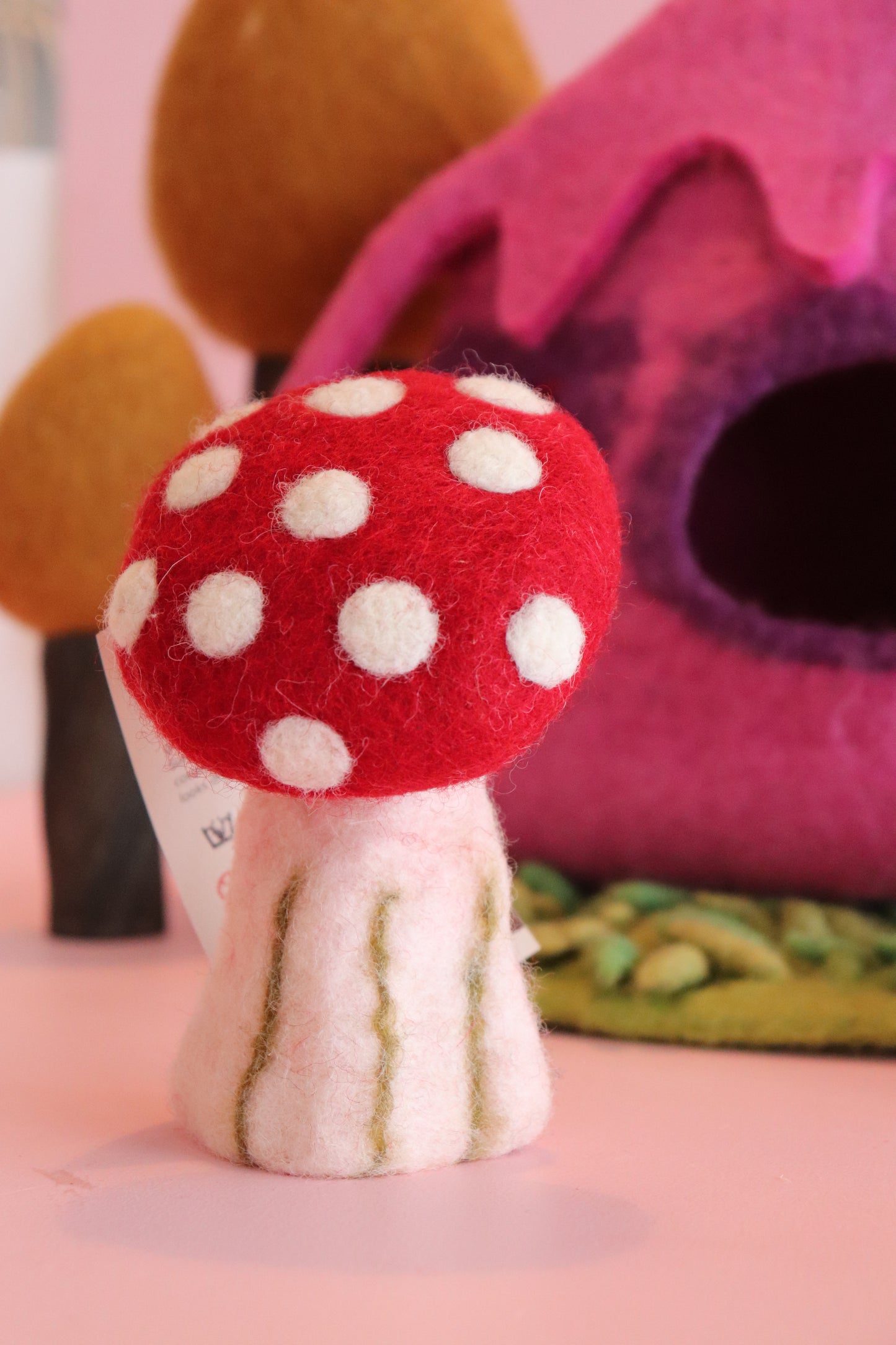 Small red and white spot felt mushrooms