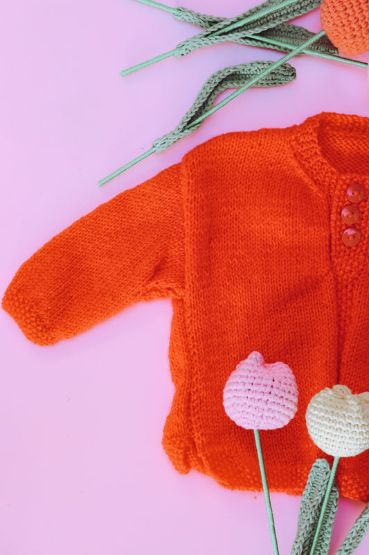 Hand Knitted orange jumper